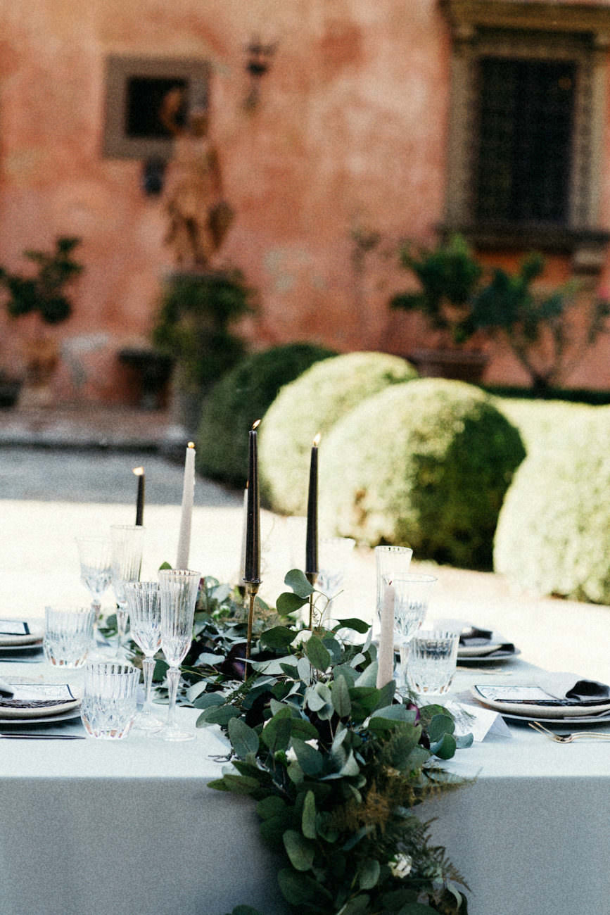 Style Shoot in Tuscany, Italy wedding chair idea with leaves.