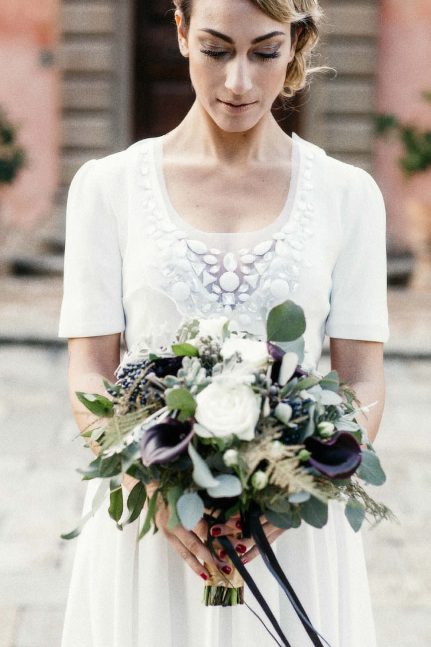 Style Shoot in Tuscany, Italy bride with dark flowers
