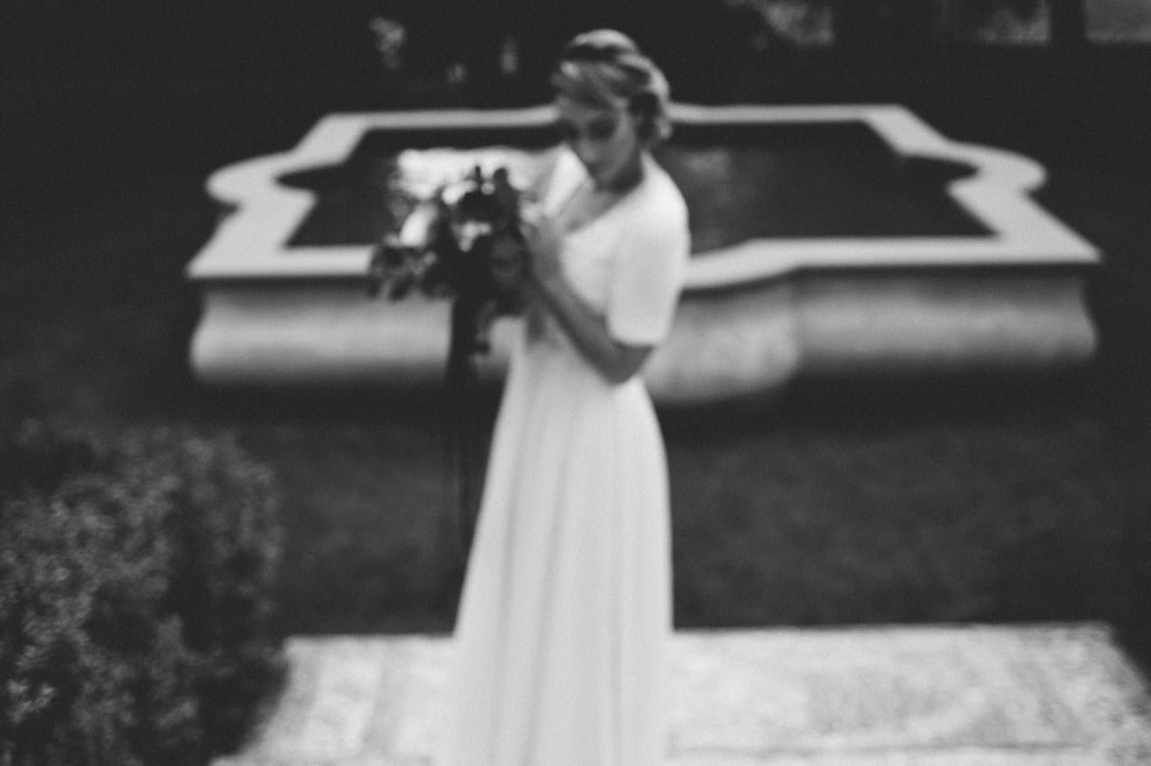 Style Shoot in Tuscany, Italy model in garden black and white