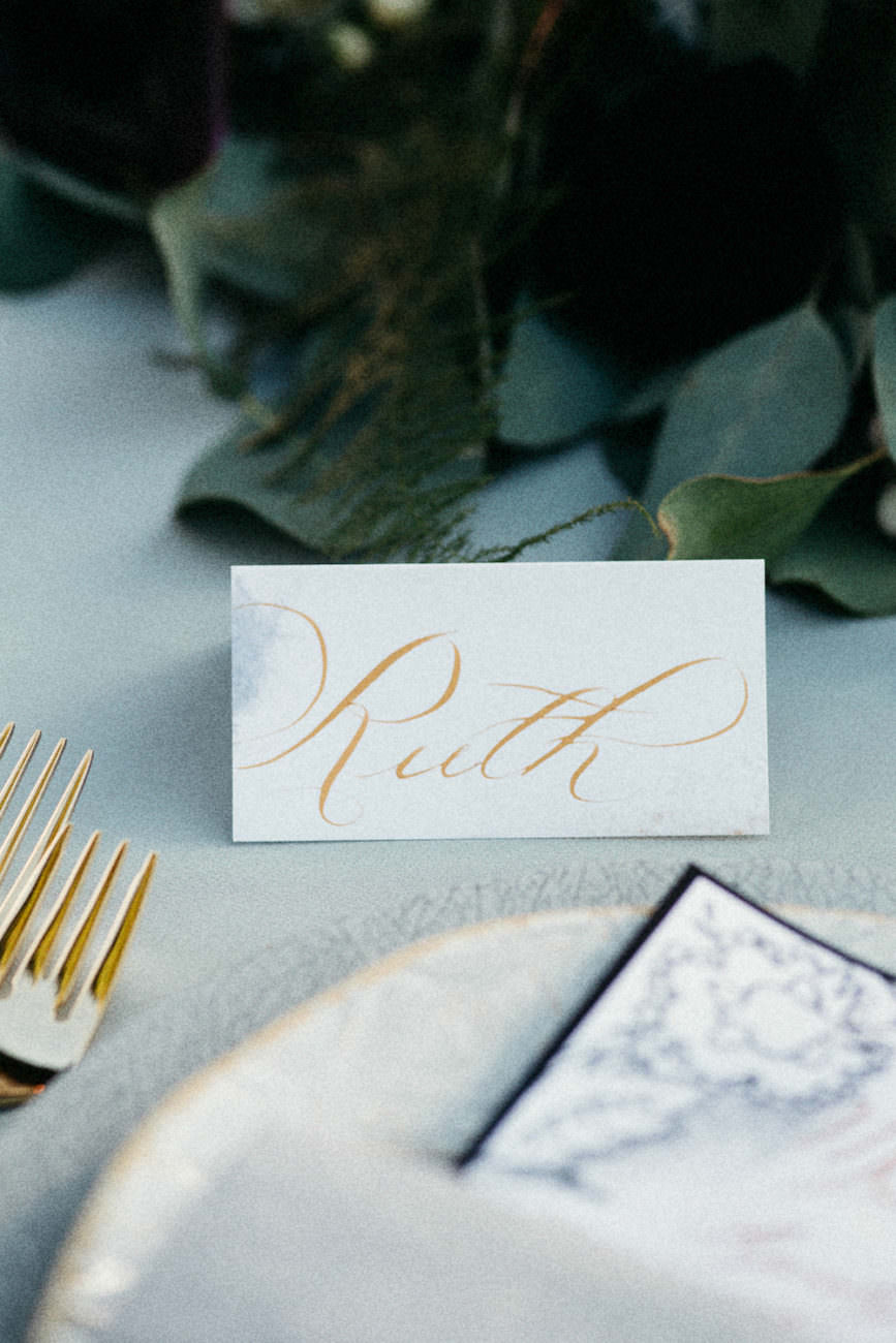 Style Shoot in Tuscany, Italy name card with gold calligraphy