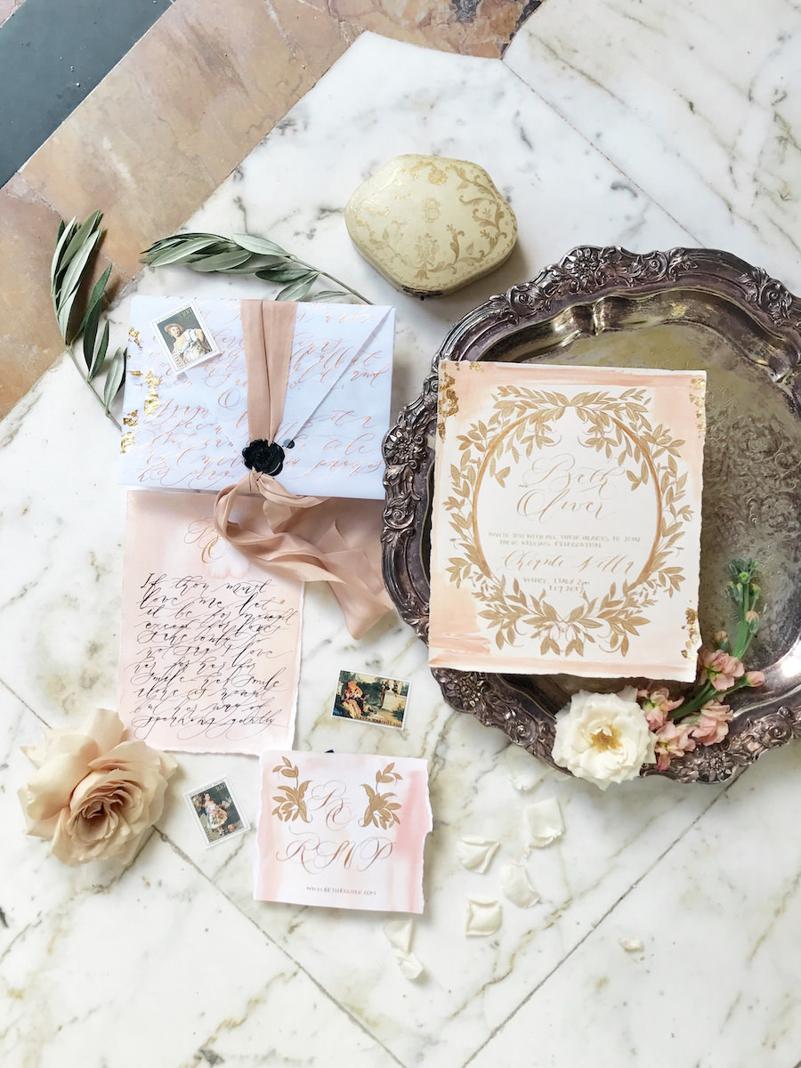 Vizcaya Wedding Inspiration wedding invitation suite with gold and blush accents with vellum envelope