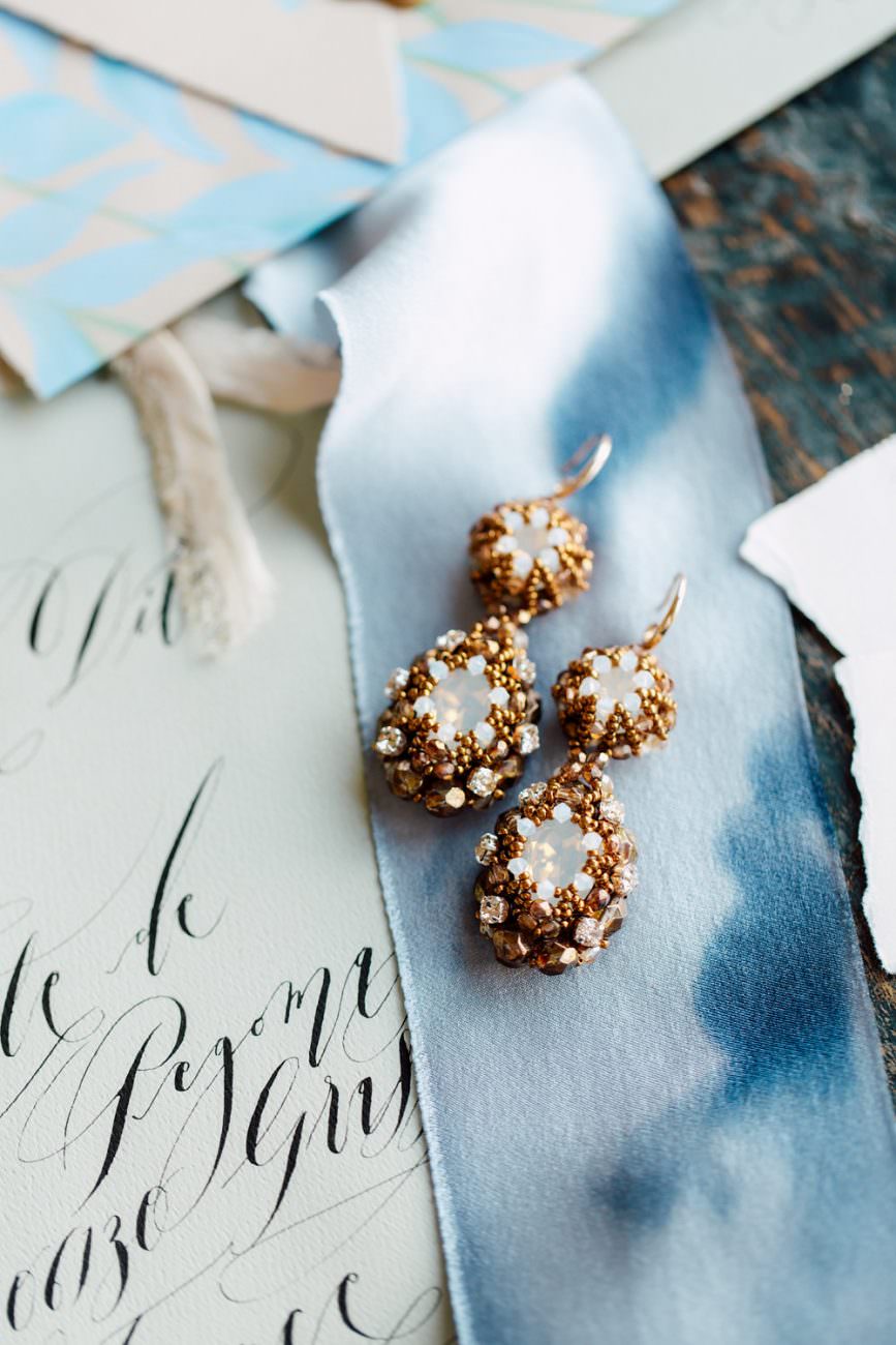 French Wedding Inspiration black calligraphy with gold earrings