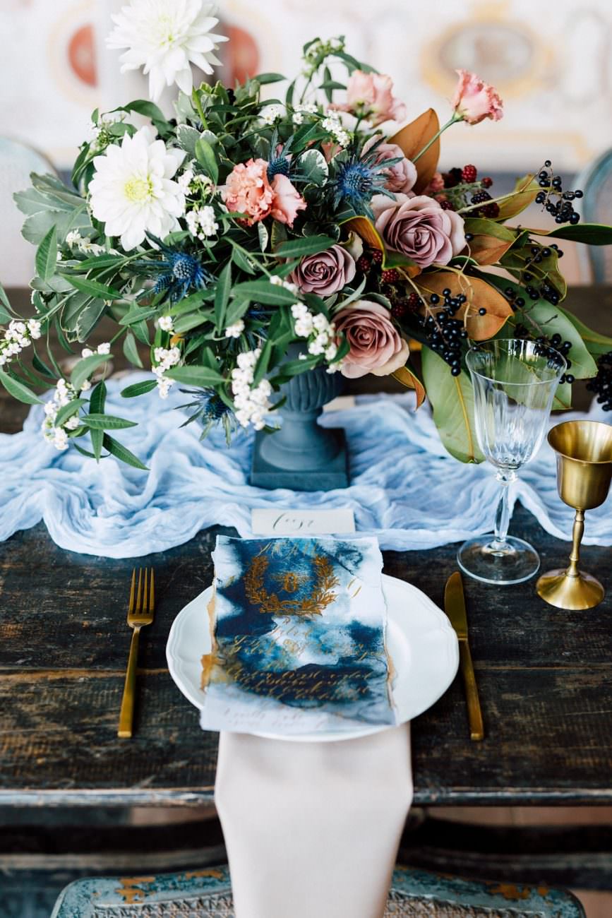 French Wedding Inspiration table setting with flowers and menu