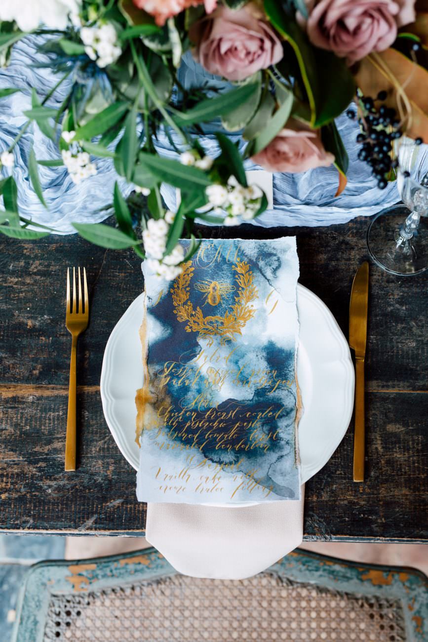 French Wedding Inspiration table setting with hand painted menu in gold