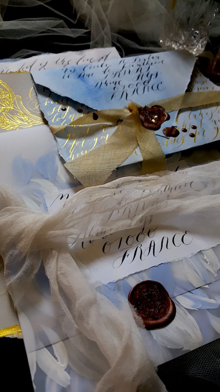 Hand Painted Wedding Invitations vellum and blue envelopes
