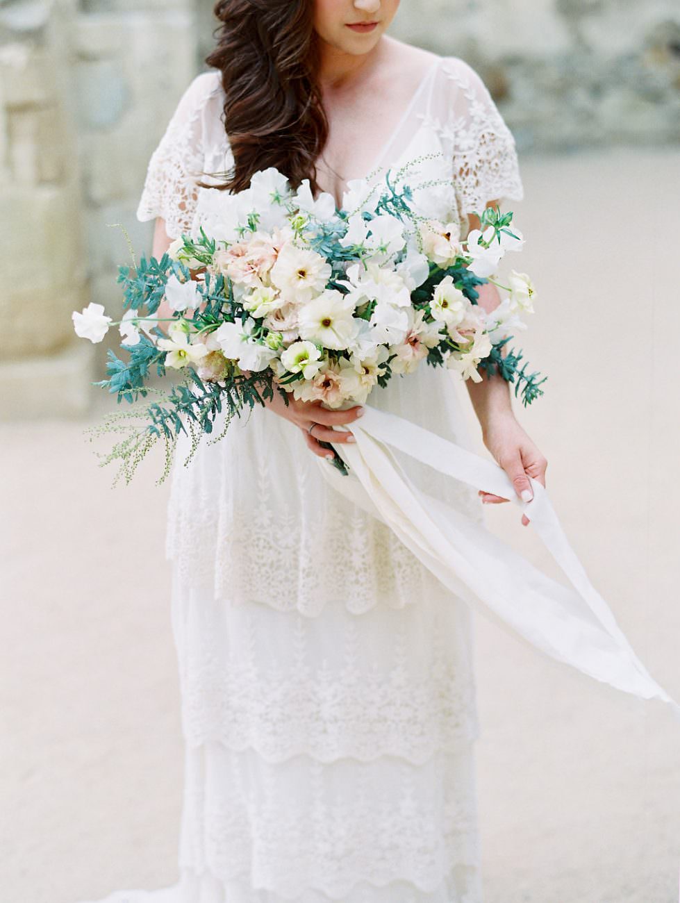 Orange Country wedding inspiration bride holding ribbons