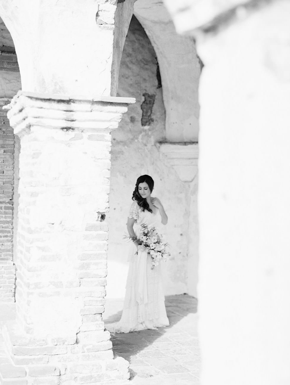 Orange Country wedding inspiration bride under arches