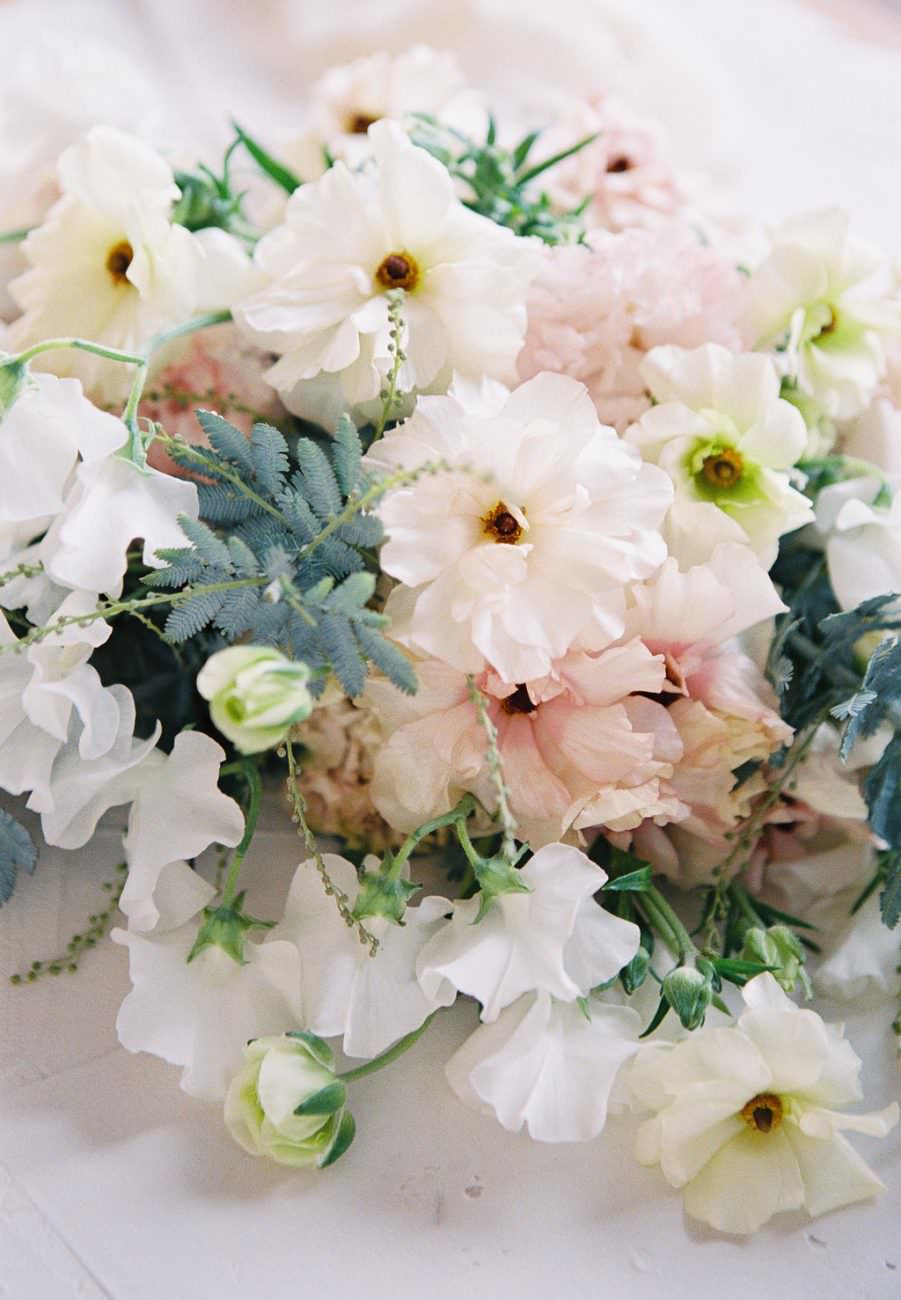 Orange Country wedding inspiration bride with floral textures with ferns