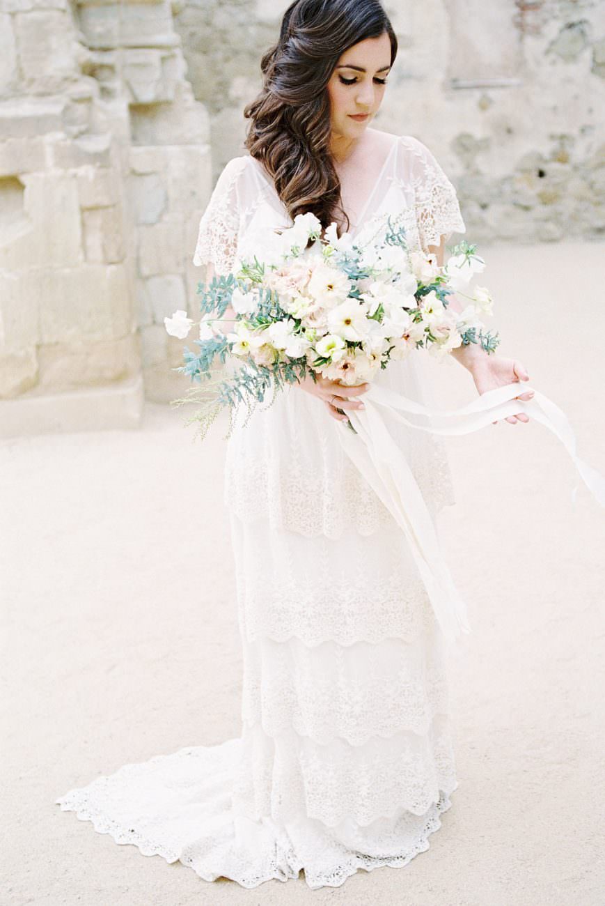 Orange Country wedding inspiration bride with florals and ribbons