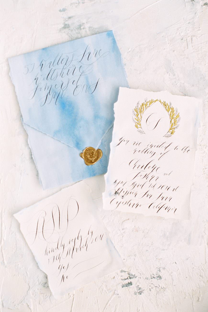 Orange Country wedding inspiration hand painted wedding invitation with floral wreath