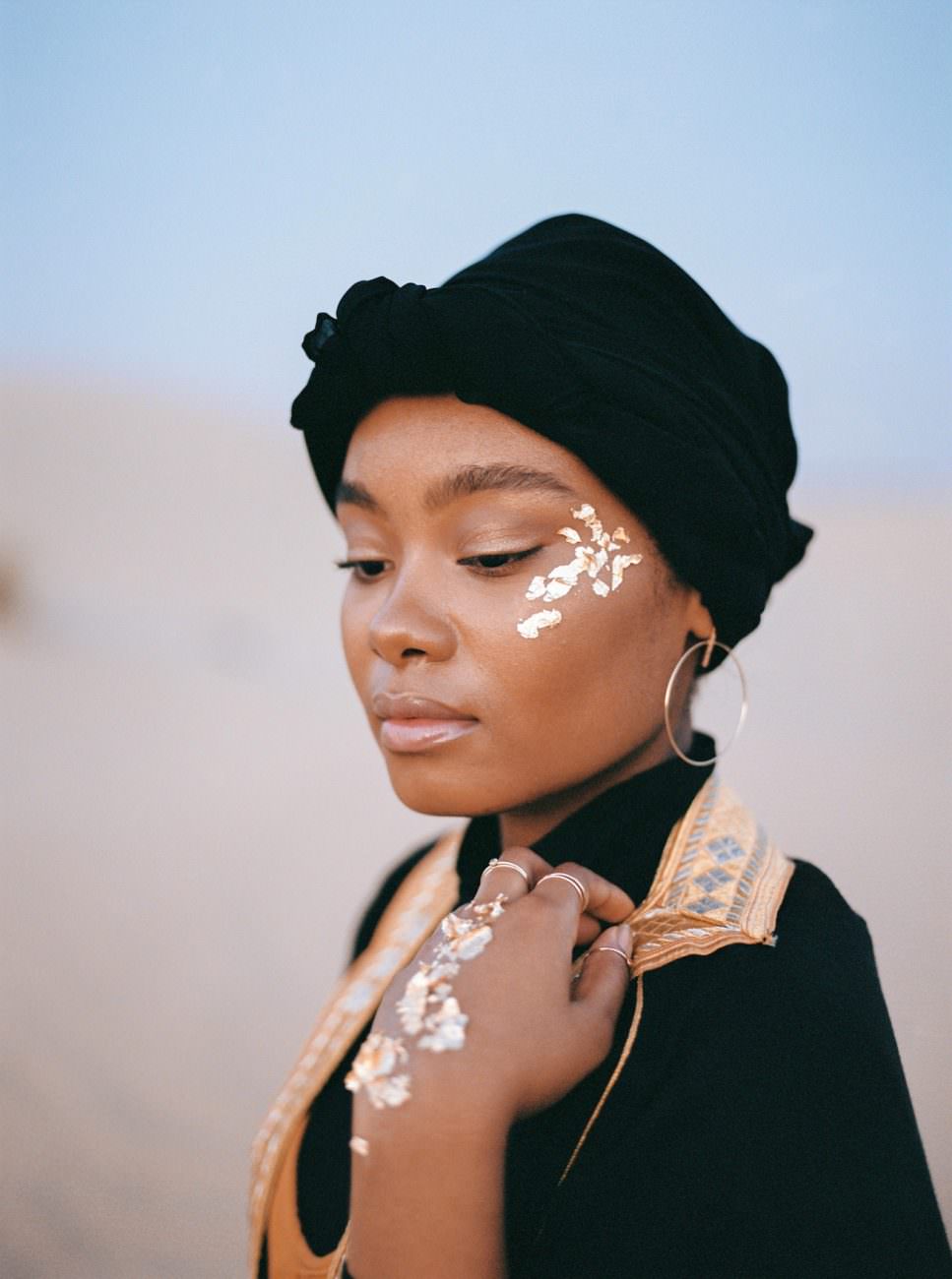 Desert fine art wedding inspiration bride with gold foil and black turban
