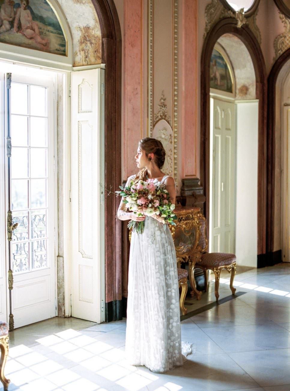 Palace Wedding Inspiration bride inside palace with flowers