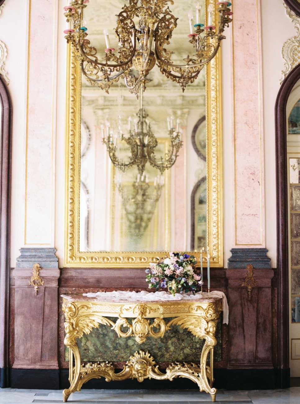 Palace Wedding Inspiration - gold antique furniture with large chandelier