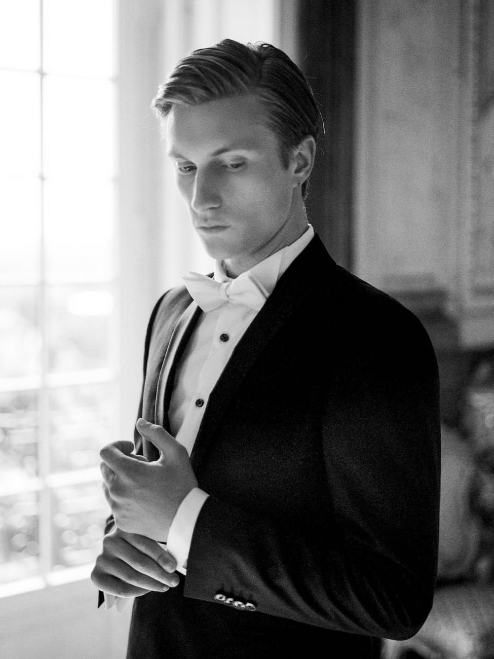 Palace Wedding Inspiration groom in black and white