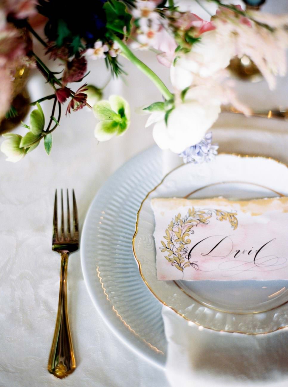 Palace Wedding Inspiration - pink place name with gold hand painted designs