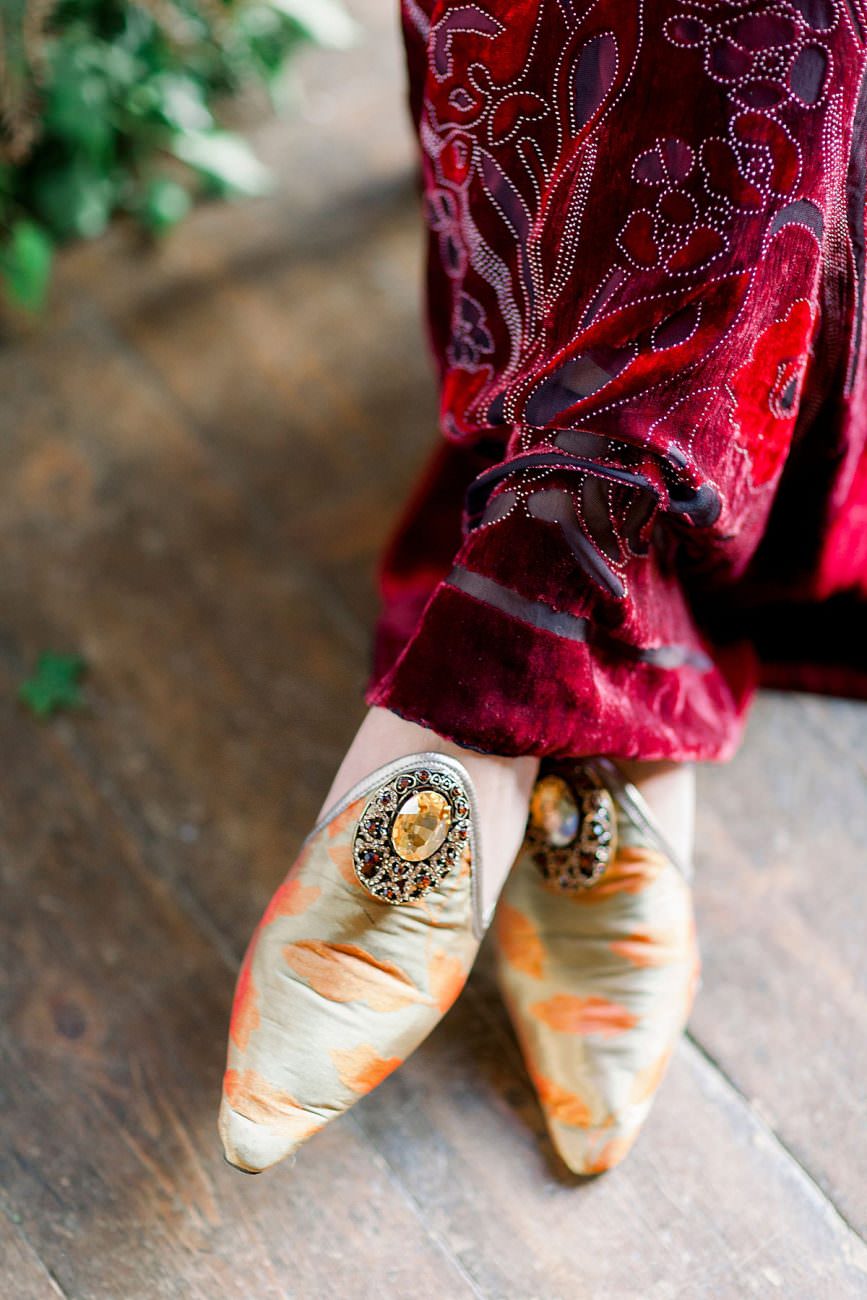 Baroque Wedding with red velvet wedding dress and gold ornate shoes