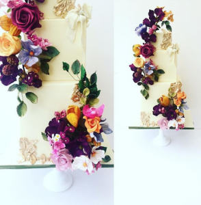 luxury wedding cake designers bright flowers