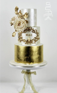 luxury wedding cake designers bright gold flowers and paint