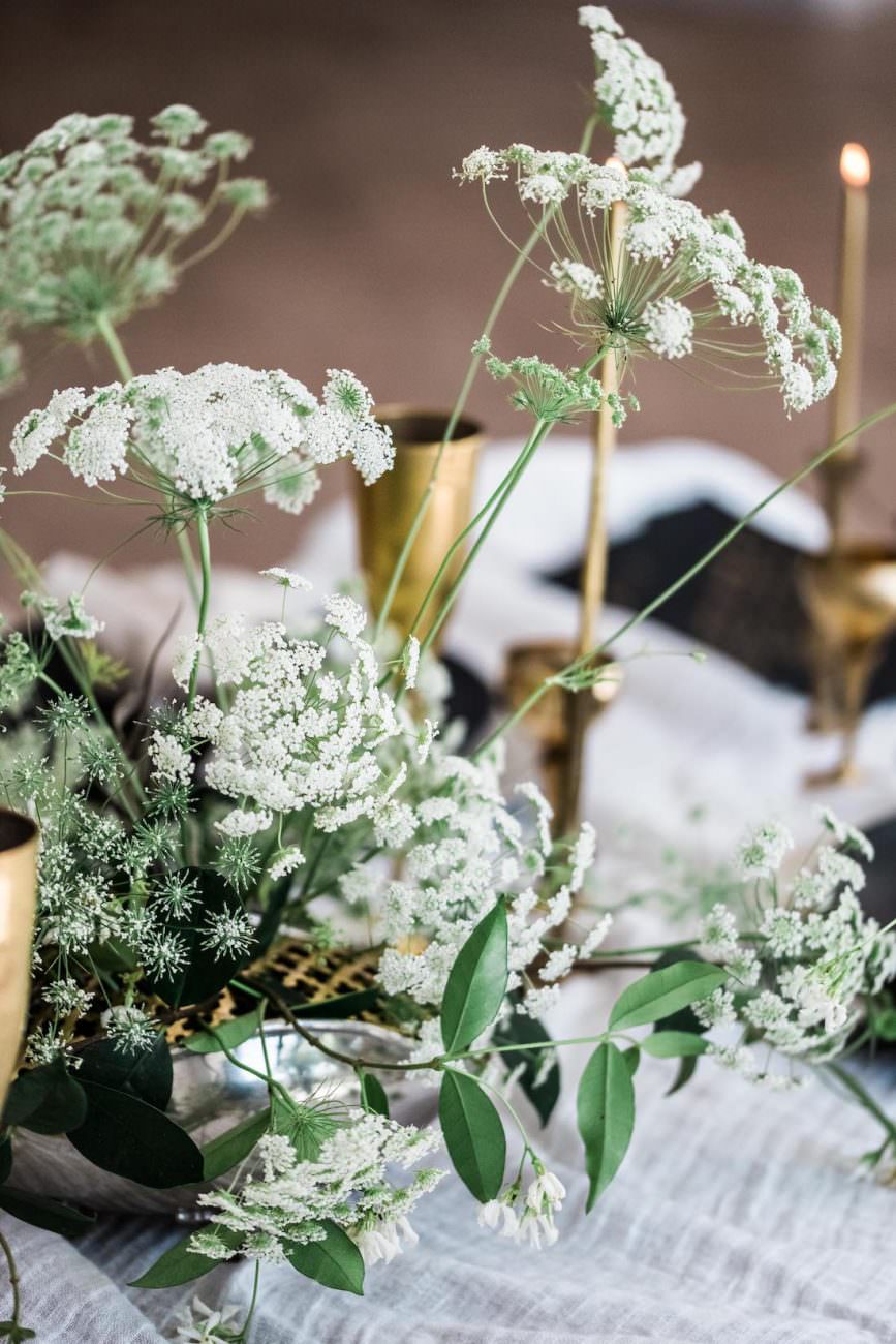 Fine Art Black Tie Wedding Inspiration Shoot green foliage with white flowers