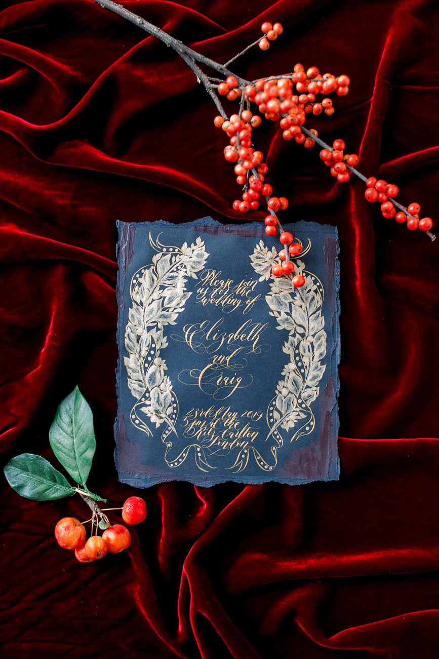 Baroque Wedding invitation card with gold leaces crest and gold calligraphy