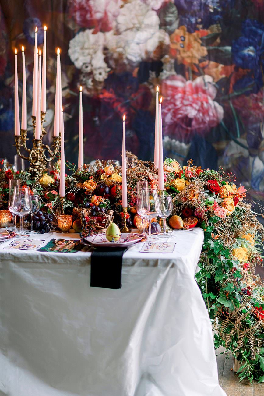 Baroque wedding ideas with a lavish table setting with pink candles and luxury stationery