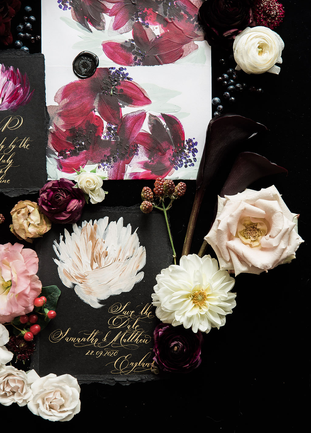 Floral wedding inspiration with wine coloured, hand painted envelope