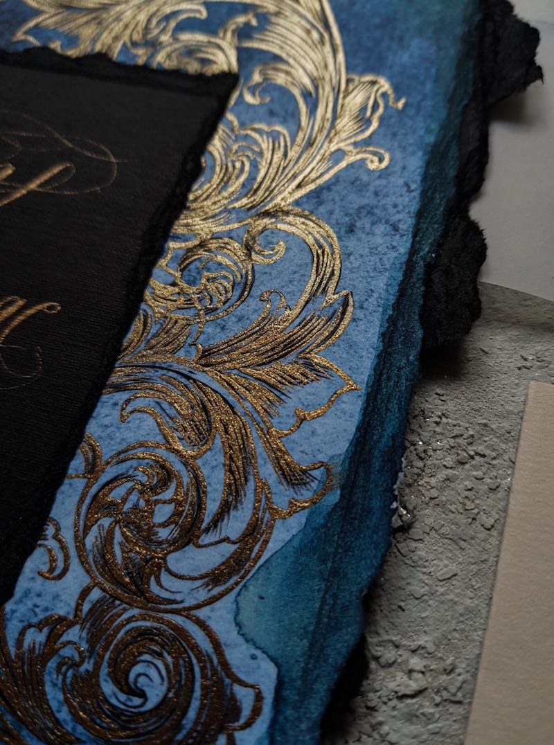 Dark navy blue watercolour wedding invitations with gold detail